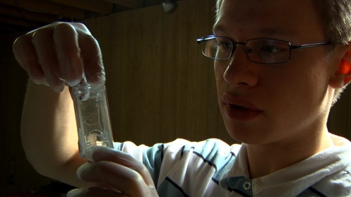 Eric Golab, a high-school honors student in Michigan, performs a cold fusion experiment in his basement.
